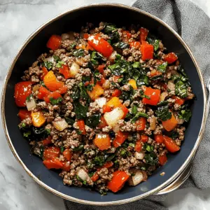 Looking for a quick and tasty dinner idea? This Mediterranean Ground Beef Stir Fry brings vibrant flavors to your table with tender beef, fresh veggies, and aromatic herbs. Perfect for busy weeknights or a nourishing meal prep option. Save this recipe to create a delicious dish that everyone will love!