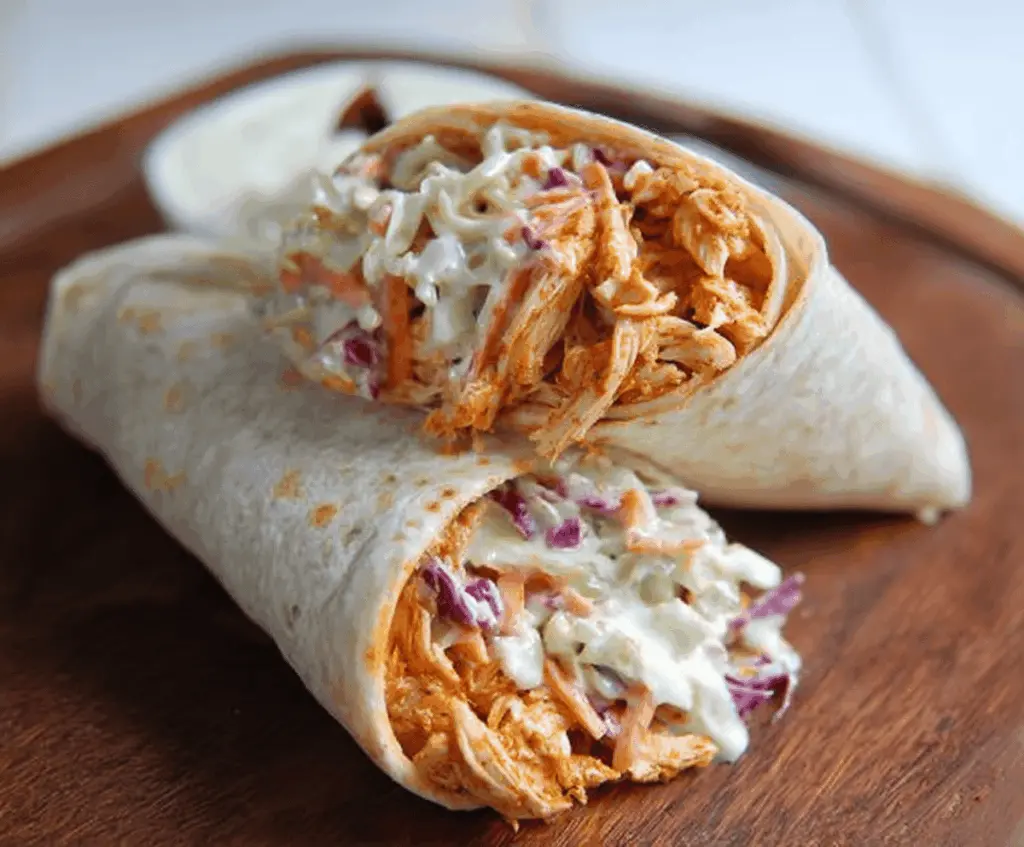 Delicious BBQ Chicken Coleslaw Wraps featuring grilled chicken, fresh coleslaw, and smoky barbecue sauce wrapped in a soft tortilla for a flavorful meal.