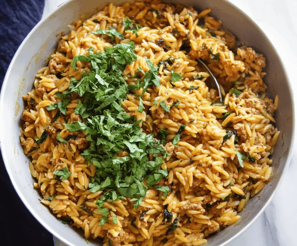 Delicious ground turkey orzo pasta dish with fresh herbs and vegetables, perfect for a healthy and flavorful meal