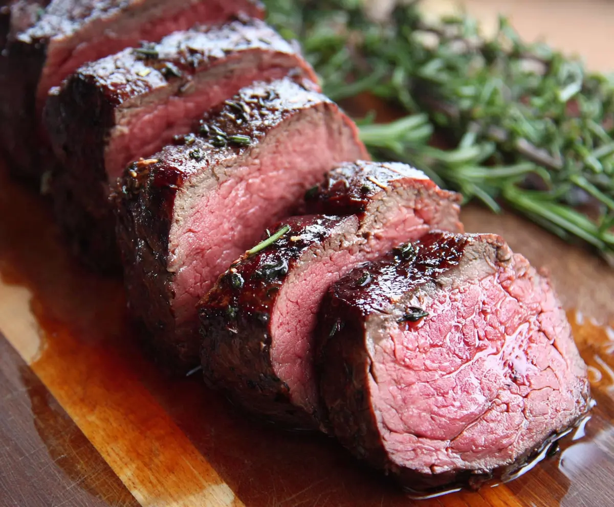 Delicious best ever beef tenderloin ready to serve with a crispy crust and juicy interior.